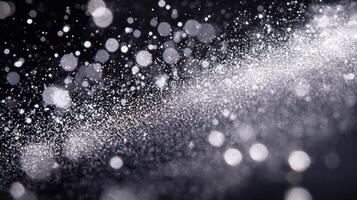 Silver dots create a mesmerizing galaxy-like formation, glowing softly in the darkness. Each particle crafts an ethereal constellation, blending minimalism with cosmic wonder. photo
