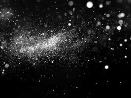 Scattered silver dots shimmer brightly against a dark background, creating a cosmic effect that simulates the enchantment of stardust in a digital universe. photo