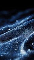 An enchanting display of silver particles swirls in a captivating vortex, exuding a cosmic energy. The shimmer intensifies toward the center, evoking a sense of dynamic movement. photo