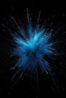 An energetic explosion of blue particles unfolds dramatically, scattering and glowing as they expand outward against a black background, resembling cosmic forces at play. photo