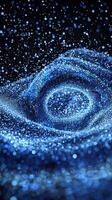 A captivating arrangement of luminous blue particles dances in a vortex formation against a deep black background, evoking a sense of cosmic energy and dynamic beauty. photo