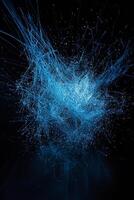 An energetic explosion of blue particles radiates outward against a black background, creating a mesmerizing display of cosmic energy and vibrant motion. photo