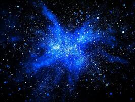 A captivating burst of blue dots and particles emanates from the center, creating a sense of movement and energy amid a dark background revealing an explosive design. photo