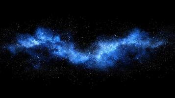 A breathtaking eruption of blue particles bursts forth, illuminating the dark expanse with radiant energy. The particles disperse dynamically, creating a cosmic theme. photo