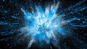 A stunning eruption of blue particles creates a vibrant explosion, glowing intensely as it radiates outward and disperses into fine cosmic dust on a dark background. photo