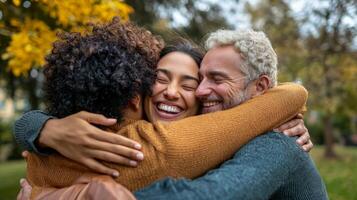 In a sunny park friends embrace with genuine smiles expressing joy at their reunion after a long separation due to the pandemic enjoying the moment together. photo