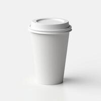empty white paper cup isolated on white background. suitable for mockups. photo