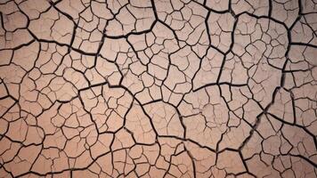 top view of cracked dry soil with texture for background photo