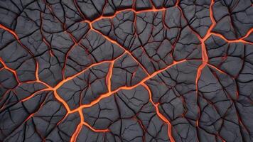 Hot lava through cracked ground. Burnt black magma and soil texture. background Surface of an active volcano. photo
