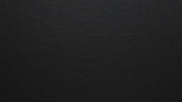 black paper with texture as background photo
