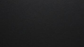 black paper with texture as background photo