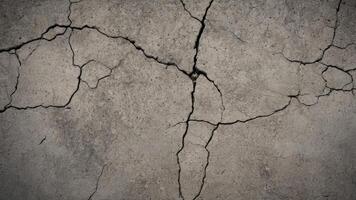 top view of old cracked asphalt texture as background photo