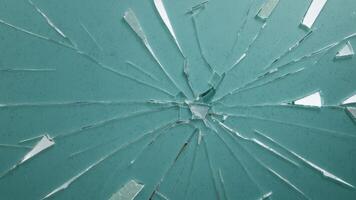 broken glass texture on green background photo