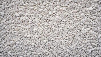 white pebbles with texture as background. photo