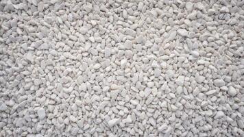 white pebbles with texture as background. photo