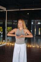 The girl does yoga and is in a state of meditation. The concept of a healthy lifestyle photo
