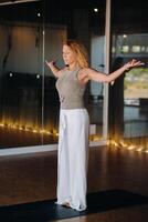 The girl does yoga and is in a state of meditation. The concept of a healthy lifestyle photo