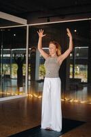 The girl does yoga and is in a state of meditation. The concept of a healthy lifestyle photo