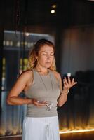 The girl does yoga and is in a state of meditation. The concept of a healthy lifestyle photo