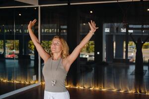 The girl does yoga and is in a state of meditation. The concept of a healthy lifestyle photo