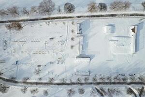 Top view of an empty sports field in a winter park. Infrastructure for winter sports photo