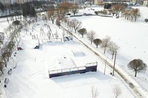 Top view of an empty sports field in a winter park. Infrastructure for winter sports photo