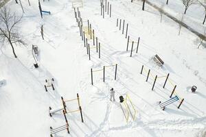Top view of an empty sports field in a winter park. Infrastructure for winter sports photo