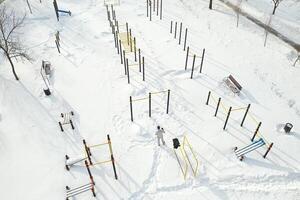 Top view of an empty sports field in a winter park. Infrastructure for winter sports photo