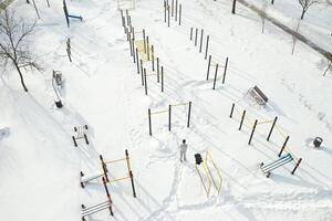 Top view of an empty sports field in a winter park. Infrastructure for winter sports photo