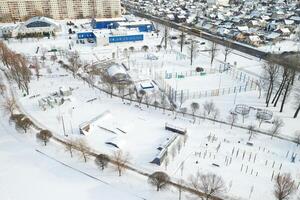 Top view of an empty sports field in a winter park. Infrastructure for winter sports photo