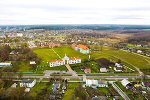 Ruzhansky Palace and the ruins of the facade of an abandoned ruined building of an ancient castle of the 18th century.Belarus photo