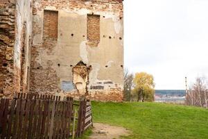 Ruzhansky Palace and the ruins of the facade of an abandoned ruined building of an ancient castle of the 18th century.Belarus photo