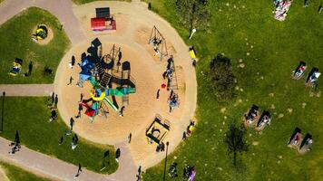 View from the height of the playground and vacationing people in Drozdy in Minsk.Belarus photo