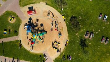 View from the height of the playground and vacationing people in Drozdy in Minsk.Belarus photo