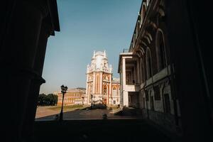 Grand Palace in Tsaritsyno in summer, Russia. Tsaritsyno Park is one of the main tourist attractions in Moscow. Beautiful scenic view of the old Tsaritsyn complex in summer photo