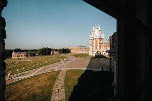 Grand Palace in Tsaritsyno in summer, Russia. Tsaritsyno Park is one of the main tourist attractions in Moscow. Beautiful scenic view of the old Tsaritsyn complex in summer photo