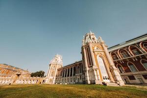 Grand Palace in Tsaritsyno in summer, Russia. Tsaritsyno Park is one of the main tourist attractions in Moscow. Beautiful scenic view of the old Tsaritsyn complex in summer photo