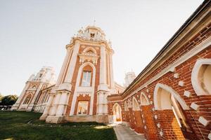 Grand Palace in Tsaritsyno in summer, Russia. Tsaritsyno Park is one of the main tourist attractions in Moscow. Beautiful scenic view of the old Tsaritsyn complex in summer photo