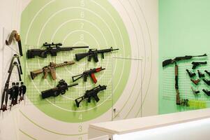 A lot of different weapons for shooting in the dash.Air guns for shooting training. photo