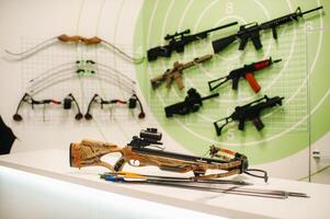 A lot of different weapons for shooting in the dash.Air guns for shooting training. photo