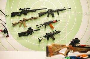 A lot of different weapons for shooting in the dash.Air guns for shooting training. photo