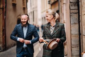 Beautiful family with walks in the old city of Lyon in France.A couple walks through old Lyon in France photo