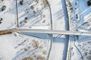 Top view of the pedestrian bridge over the frozen Svisloch river in Minsk. Belarus photo