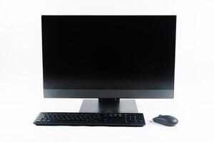 monoblock with keyboard and mouse on a white background.The computer is on white isolate photo