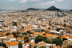 Cityscape of Athens and Lycabettus Hill in the background, Athens, Greece. photo