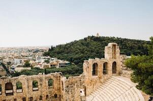 View from above to Dionysus Theatre below the Acropolis in Athens, Greece, which is considered to be the worlds first theater aka Odeon of Herodes Atticus photo