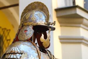 An ancient Knight's helmet with armor.A medieval concept photo