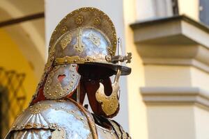 An ancient Knight's helmet with armor.A medieval concept photo