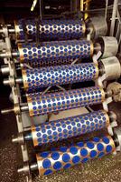 roller for stamping dough in the manufacture of cookies in the factory.Roller for embossing dough photo
