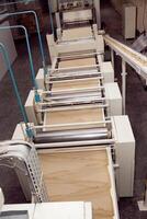 machine for making cookies in the factory. Conveyor belt with Cookie dough photo